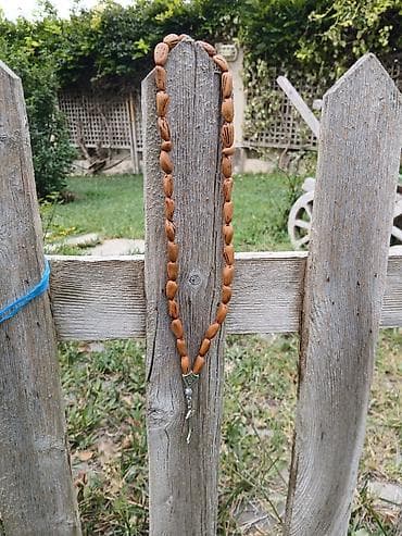 buji: Zülfüqarlı təbii toxum dənələrindən( şam ağacı toxumu) hazırlanmış əl — 3