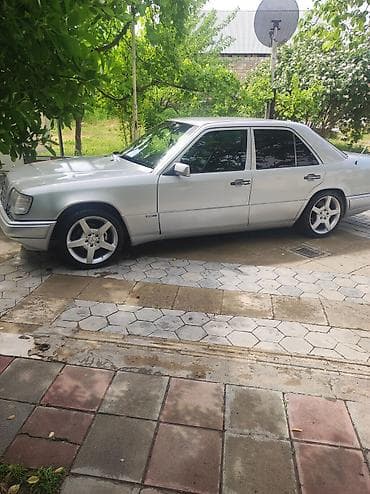 opel astra h sport purjun: Mercedes-Benz sedan (W124 seri r17 orjinal saz vəziyətdə görunduyu — 1