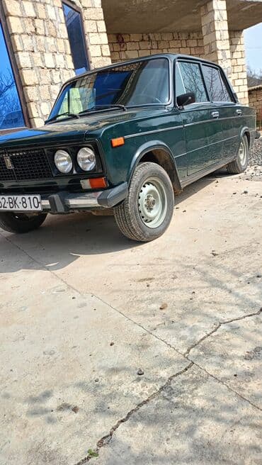 07 sekilleri cekmek: VAZ 2106 sedan - Kuzov: 4 qapılı sedan, tünd yaşıl rəng - Ön hissə — 2