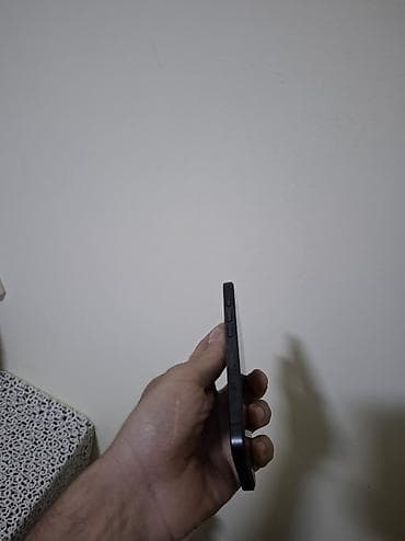 iphone 15 plus mavi: IPhone 15 Pro, 128 GB, Graphite, Face ID — 10