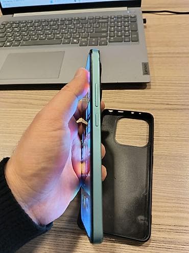 nothing phone 2 qiyməti: Redmi smartfon. Hec bir prblemi yoxdu - Rəng: Yaşıl/teal tonlu mat — 6