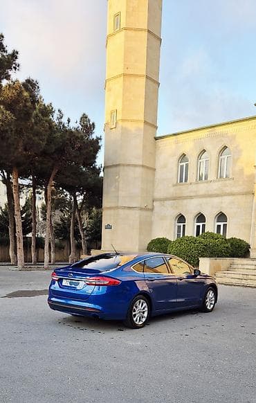 Ford: Model: Ford Fusion (mavi sedan) Texniki xüsusiyyətlər və təchizat: - — 10