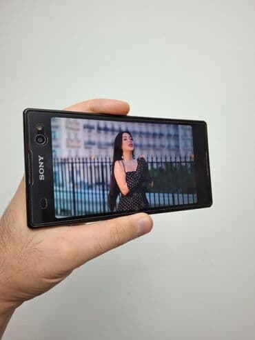 Бытовая техника: Sony Xperia C3 Dual, 8 ГБ, цвет - Черный — 2