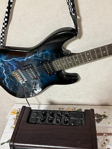 elektrik gitara: Elektrik gitara + NUX AC-25 akustik gücləndirici seti Gitara: - — 2