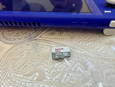 oyun qulaqciqi: Nintendo Switch Lite 
İdeal vəziyyətdə
Üstündə 128 gb yaddaş kartı — 5