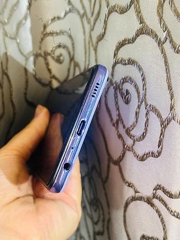 64 gb telefon: Samsung Galaxy A52, 128 GB, rəng - Bənövşəyi, Barmaq izi — 4