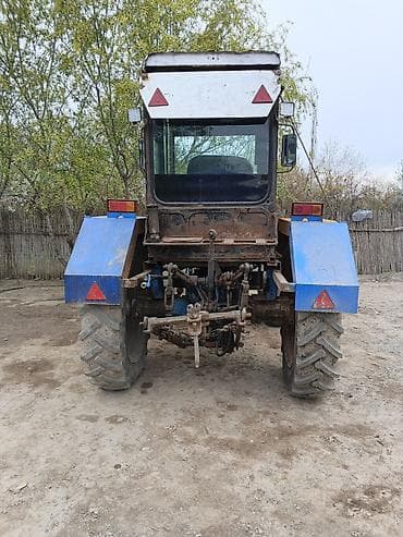 kafe avadanligi: Kənd təsərrüfatı üçün universal təkərli traktor - Kabinli, yan — 2