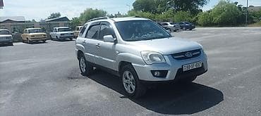 mini masin: Kia Sportage: 2 l | 2009 il Ofrouder/SUV — 7