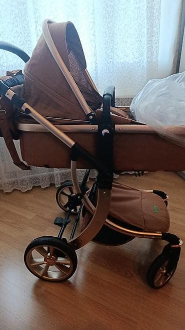 uşaq paltarı: Kidilo araba.qiymet 80 azn. unvan 6 ci mikrarayon. elaqe ucun 050 425 — 2
