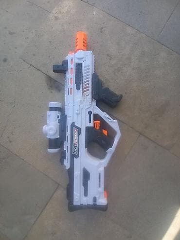 mişka şəkilləri: Oyuncaq blaster tüfəng satılır. Qiymət 30 35 arası dəyişir.Futuristik — 1