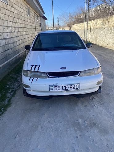 Kia Sephia: 1.5 l | 1997 il Sedan — 1