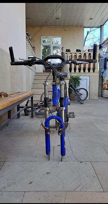 Mavi rəngli 26 lığ olimpiya velosipetidir çox az işlənilib hər şeyi