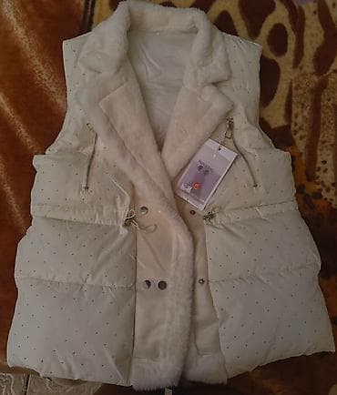 Aksesuarlar: Qadınlar üçün zərif ağ şişmə jilet - Rəng: qar ağ - Material: yumşaq — 1