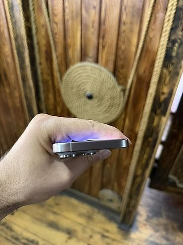 IPhone 15 Pro, Natural Titanium, Face ID — 9