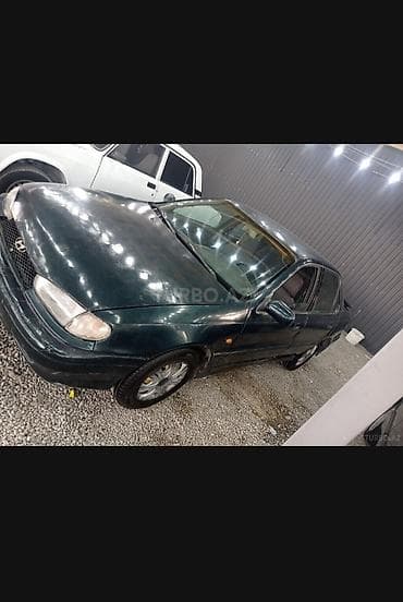 Продажа авто: Hyundai Elantra: 1.5 л | 1995 г. Седан — 7