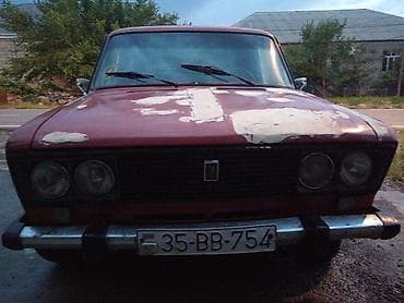 bufer satisi: VAZ 2106, qırmızı rəng. Sedan, arxa ötürücülü, mexaniki sürətlər — 3
