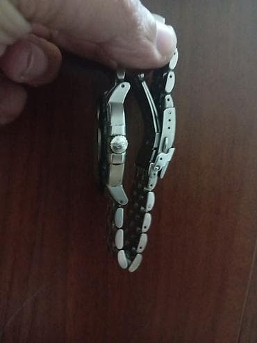 saat original: Kişi qol saatı – metal biləkbağı və təqvim funksiyalı - Korpus — 4