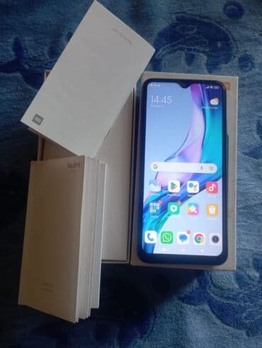 xiaomi 12s ultra qiyməti: Redmi 9 smartfonu, qara rəngdə, öz qutusunda və sənədləri ilə təqdim — 3