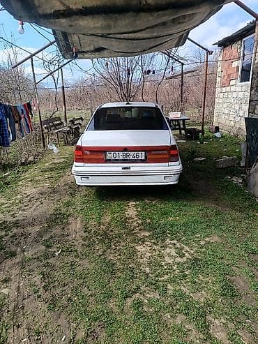 daewoo nexia 2009: Daewoo Nexia sedan, ağ rəng. - Kuzov: 4 qapılı, geniş salon və iri — 4