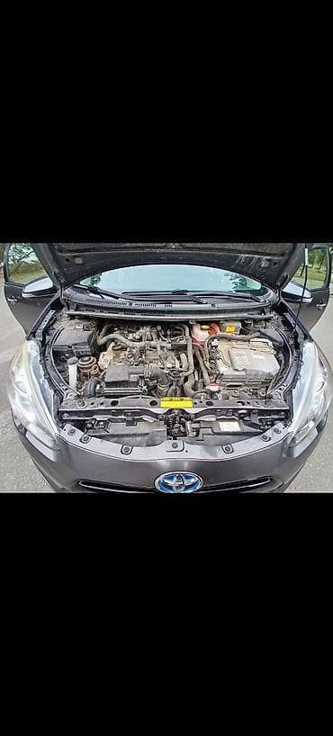 çen: Toyota Prius: 1.5 l | 2016 il Hetçbek — 2