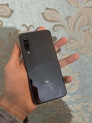 philips xenium 9@9s: Xiaomi Mi 9 SE, rəng - Qara, 
 Sensor, Barmaq izi, İki sim kartlı — 1