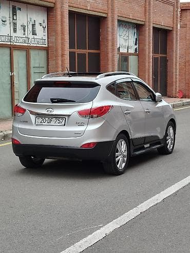 kia caren 2012: Hyundai ix35: 2 l | 2011 il Krossover — 3