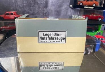 metbex tavan modelleri: Коллекционная модель Mercedes-Benz Unimog U411 Technical Relief blue — 2