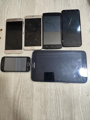 doogee f2 ibiza: Telefon və planşet paketi Şəkildə görünən müxtəlif modellər bir — 1