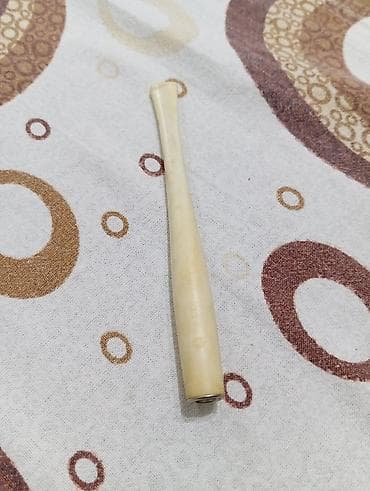 qelyan icare: Məhsul: Siqaret ucu (ehtimalən südlü-ağ akril/selüloid materialdan) — 1