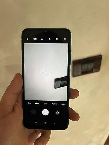 домашний телефон: Redmi 9A, 64 ГБ, цвет - Голубой, Две SIM карты — 7