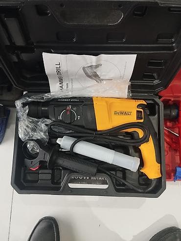 Пилы: Məhsul: DeWALT döyməli matkap (rotary hammer) – çamadanla Təsvir: - — 1