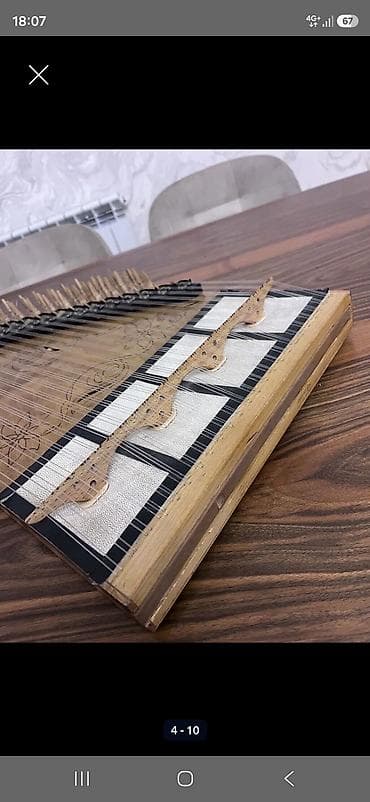 real gitara: Məhsul: Kanon(qanun) musiqi aləti Kanon (qanun) musiqi aləti Alet — 4
