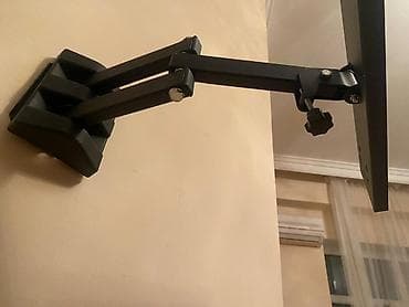 Divarlı dönər-qol TV/monitor asqısı. Universal Tranşteyn - Material