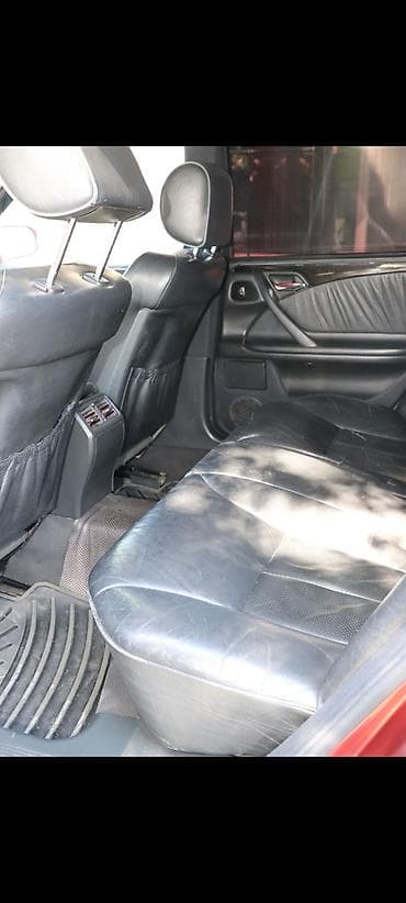 gence masin salonu: Mercedes-Benz E‑Class (W210) sedan, tünd albalı rəng. - Kuzov: 4 — 10