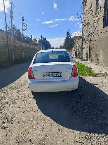 kia clarus 1997: Hyundai Accent: 1.6 l | 2009 il Sedan — 3