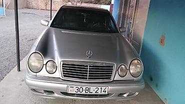 headway tekerleri: Mercedes-Benz E-Class E230 (W210) – gümüşü sedan Xüsusiyyətlər: - — 2