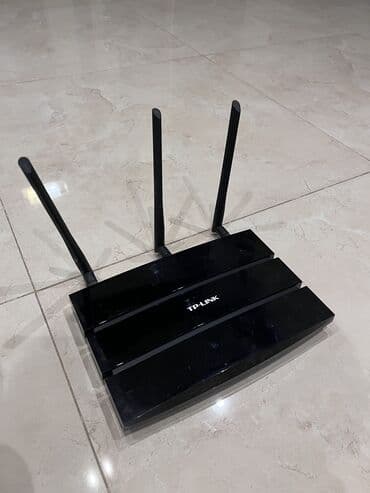 el modemi: TP Link WD8970 İkinci əl işlək vəziyyətdə — 1