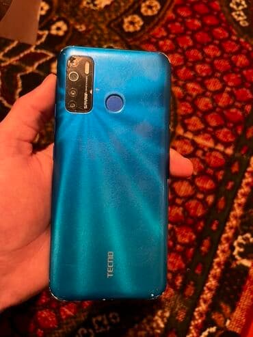 телефон fly iq4504: Tecno Spark, цвет - Голубой, Отпечаток пальца — 1