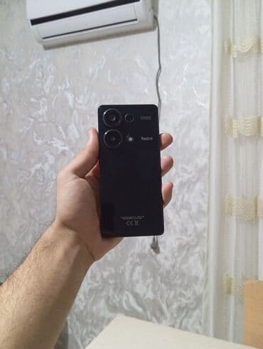 сотовый телефон fly ts113 черный: Redmi smartfon - Rəng: qara, parlaq arxa panel - Kamera: arxada çoxlu — 1