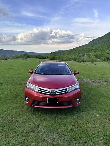 traktor satiwi: Toyota Corolla: 1.6 l | 2014 il Sedan — 1