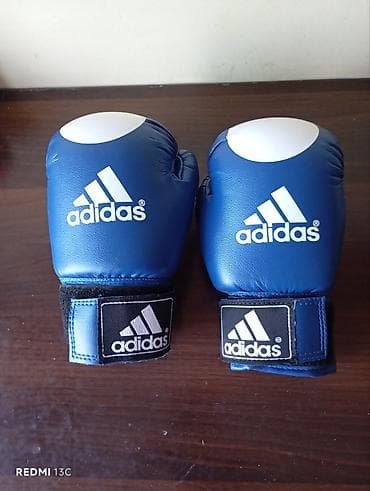 Əlcəklər: Orijinal Adidas uşaq boks əlcəkləri satılır. Ölçüsü 4 oz (4-6 yaş — 1