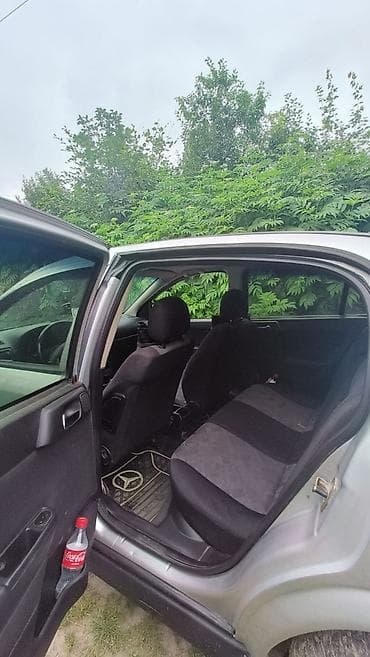 opel astra qapi: Opel Astra: 1.6 l | Sedan — 7