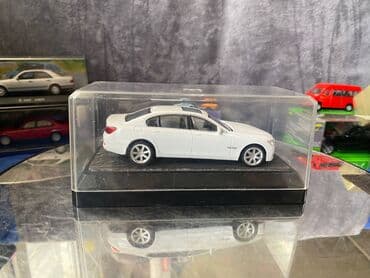 metbex tavan modelleri: Коллекционная модель BMW 750i F02 white 2008 RASTAR Scale 1:43 Art — 12