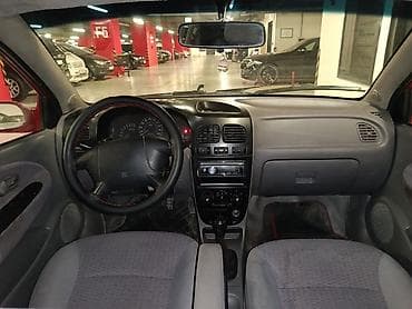 triangle teker: Kia Rio: 1.5 l | 2002 il Sedan — 4
