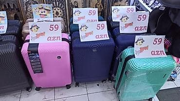 Çamadanlar: Müxtəlif rənglərdə mövcud olan bu səyahət çantası davamlı sərt korpus — 1