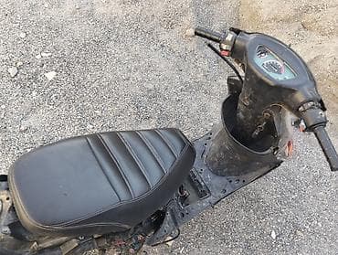 tek teker scooter: Skuter – şəhər içi qısa məsafələr üçün kompakt benzinli model - — 4