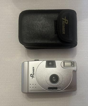 flas: Premier GP-57 35mm plyonka fotoaparatı - Kompakt, gümüşü korpus - — 2