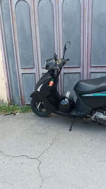 moto kasqa: Skuter – şəhər içi rahat hərəkət üçün kompakt və qənaətcil model — 5