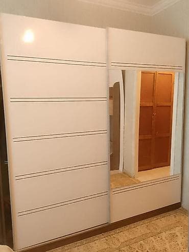 Dolab satilir 220₼. Ölçü 2.20.Hec bir problemi yoxdu.Unvan