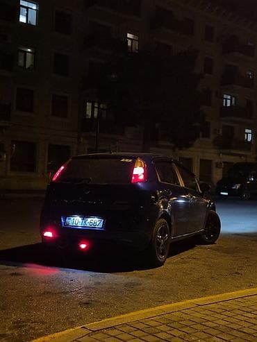 on lip universal: Fiat Grande Punto – mavi rəngli, 5 qapılı hetçbek. kondisaner sukanin — 7